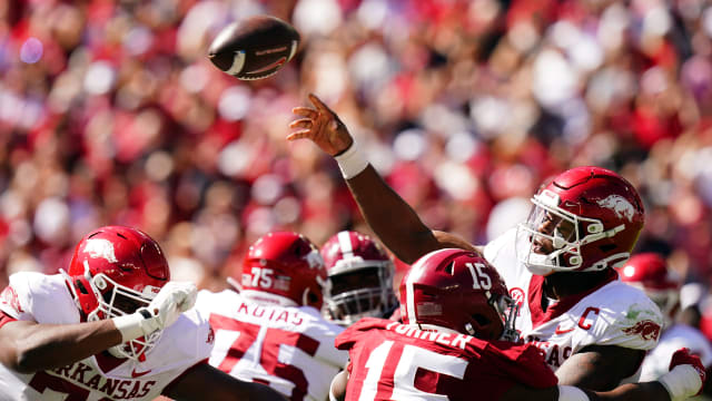 Arkansas Razorbacks quarterback KJ Jefferson (1) passing against the Alabama Crimson Tide during the second half at Bryant-Denny Stadium.